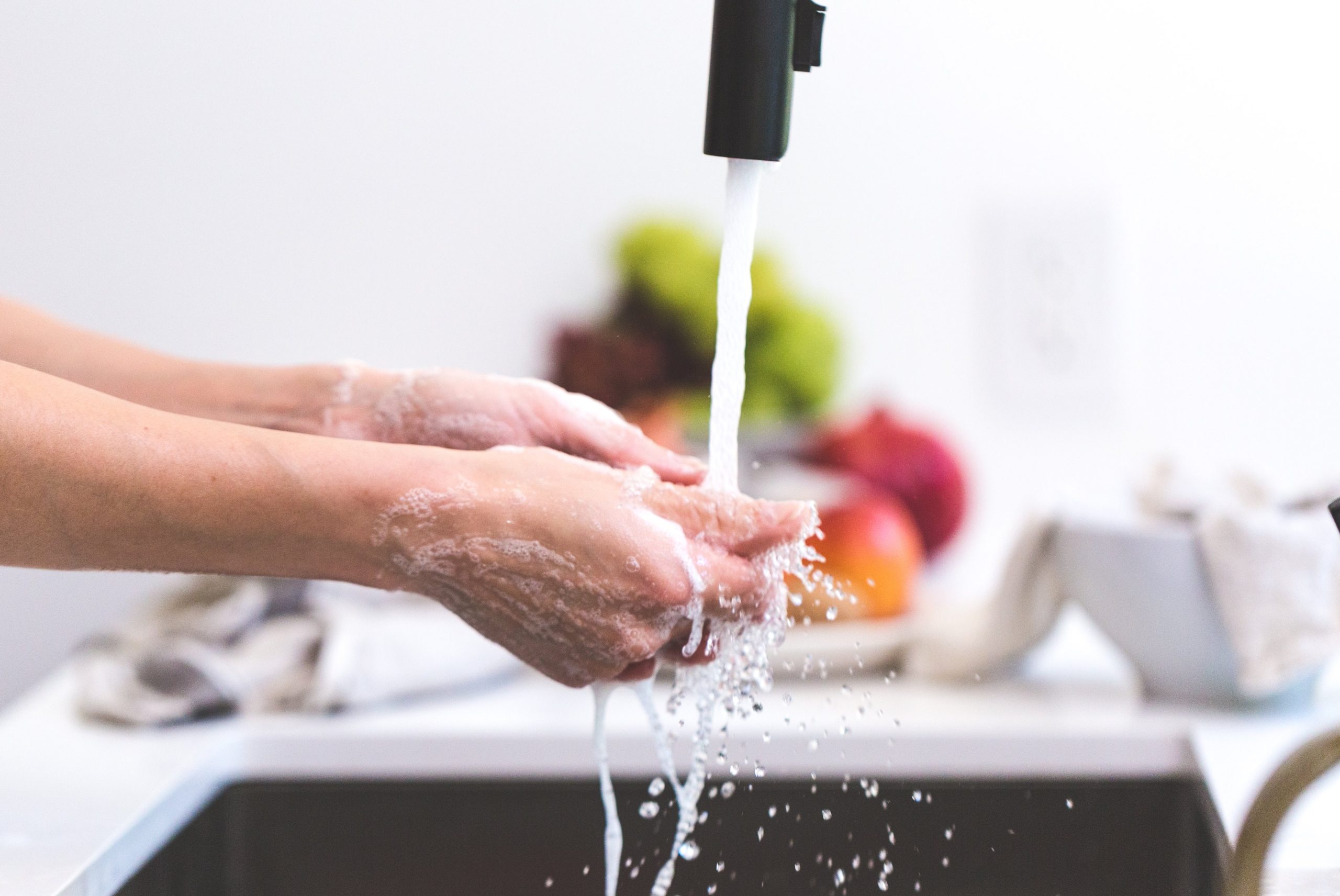 Clean hands being washed with soft water — the everyday difference a water softener makes in your Ohio home